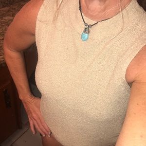 Beige sleeveless sweater